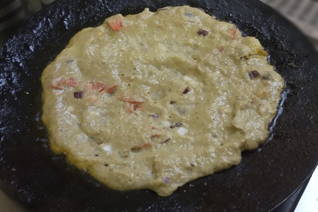 cooking moong dal chilla