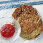 green moong dal chilla served with tomato ketchup
