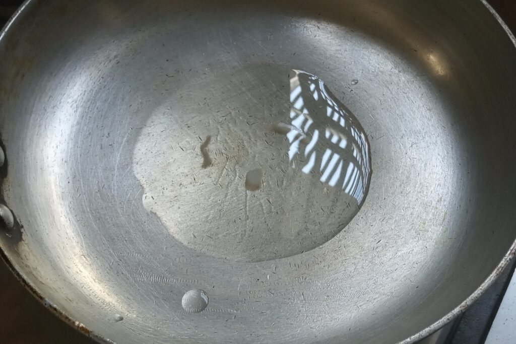 heating ghee in a pan