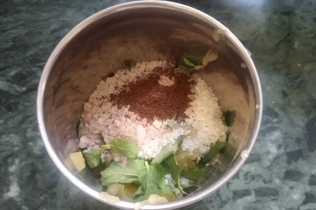 add sugar spices and mint leaves in jar