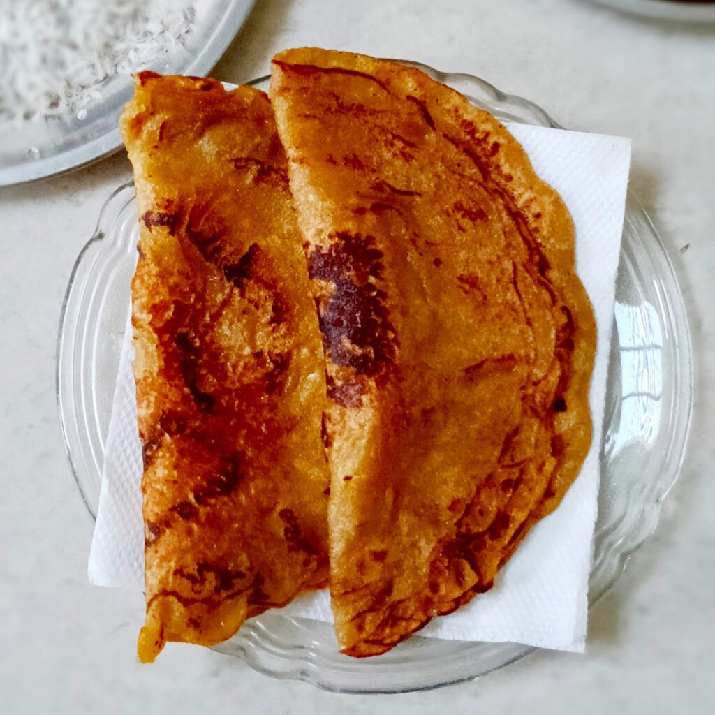meetha cheela placed on kitchen paper