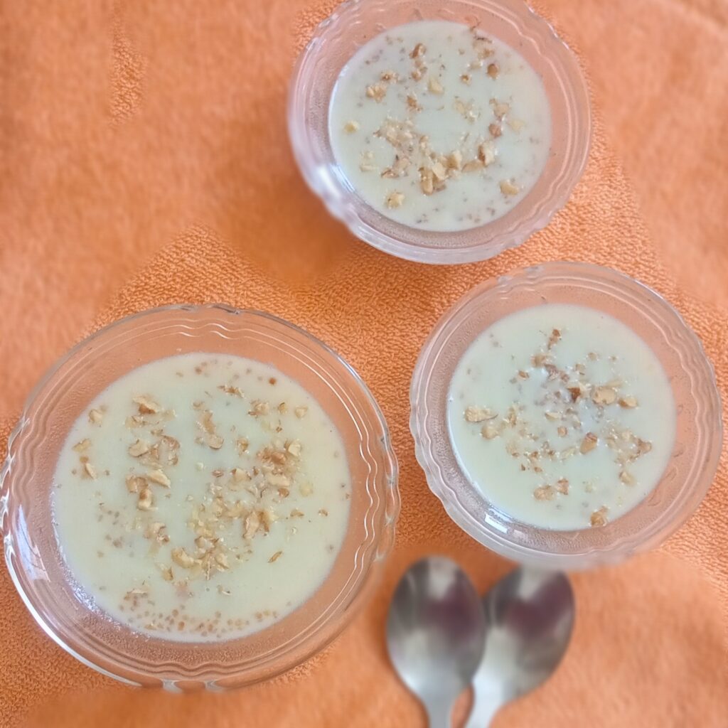 meetha daliya served with a garnish of walnuts