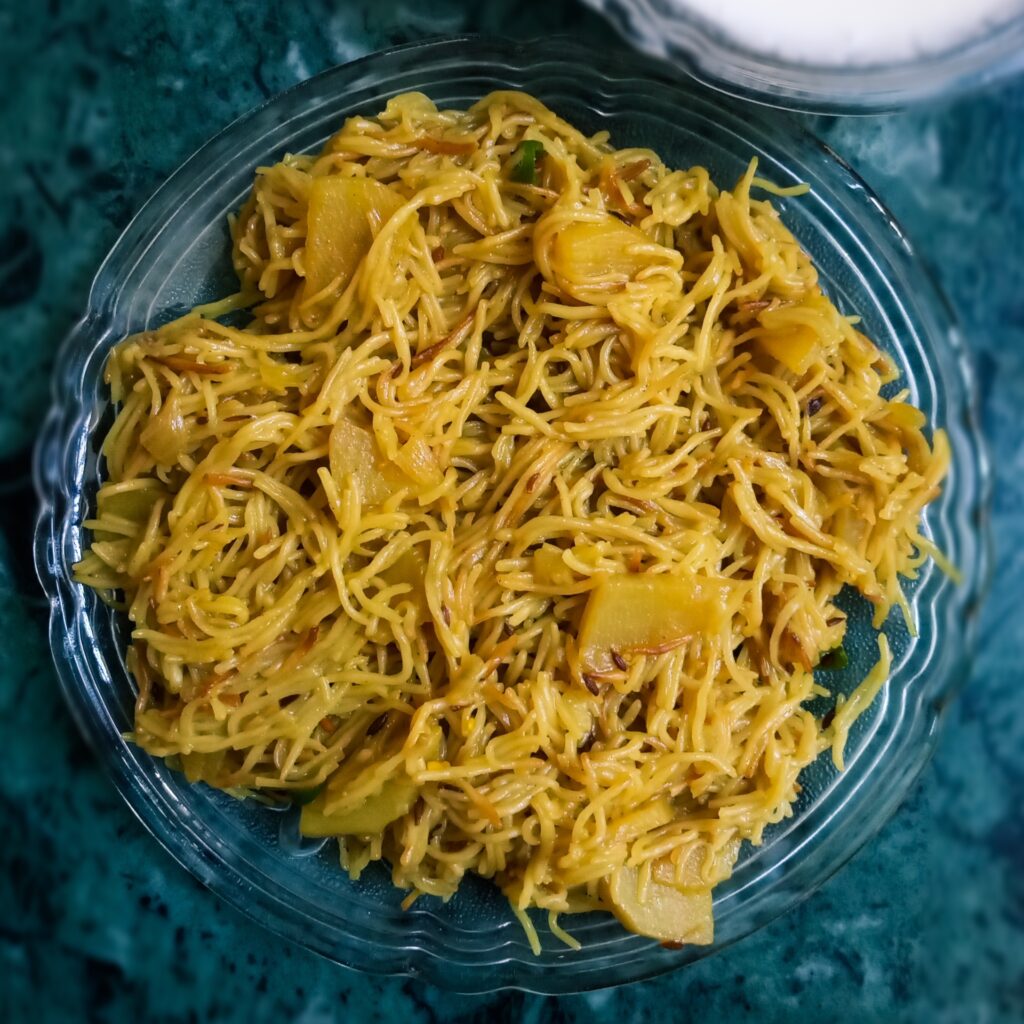 savory vermicelli with a bowl of curd