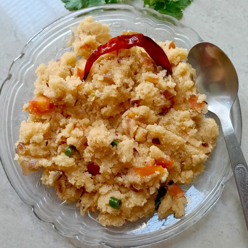 soft and moist suji upma served with spoon