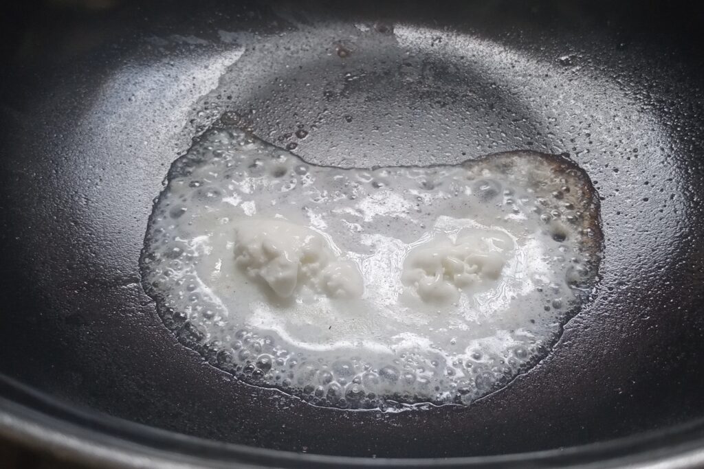 heating ghee in a kadai