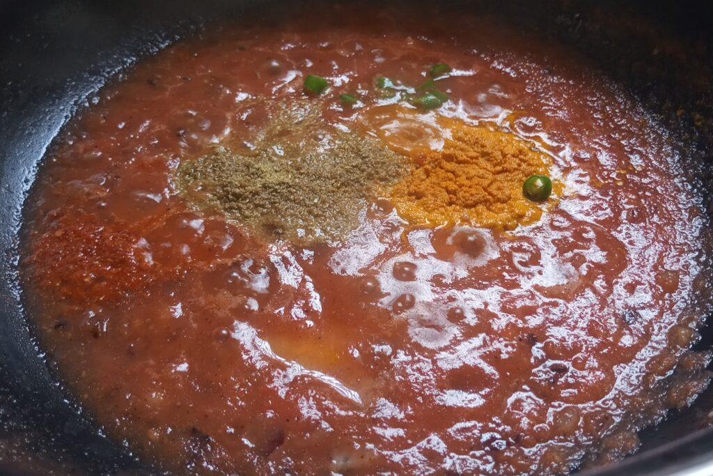 adding spices and green chili