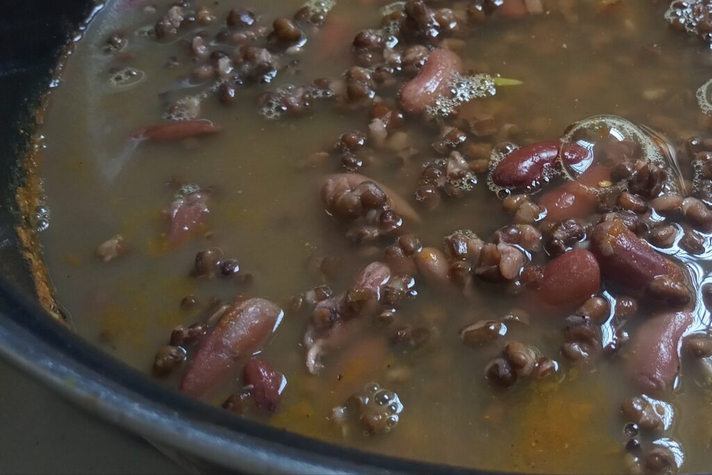adding water in rajma and dal