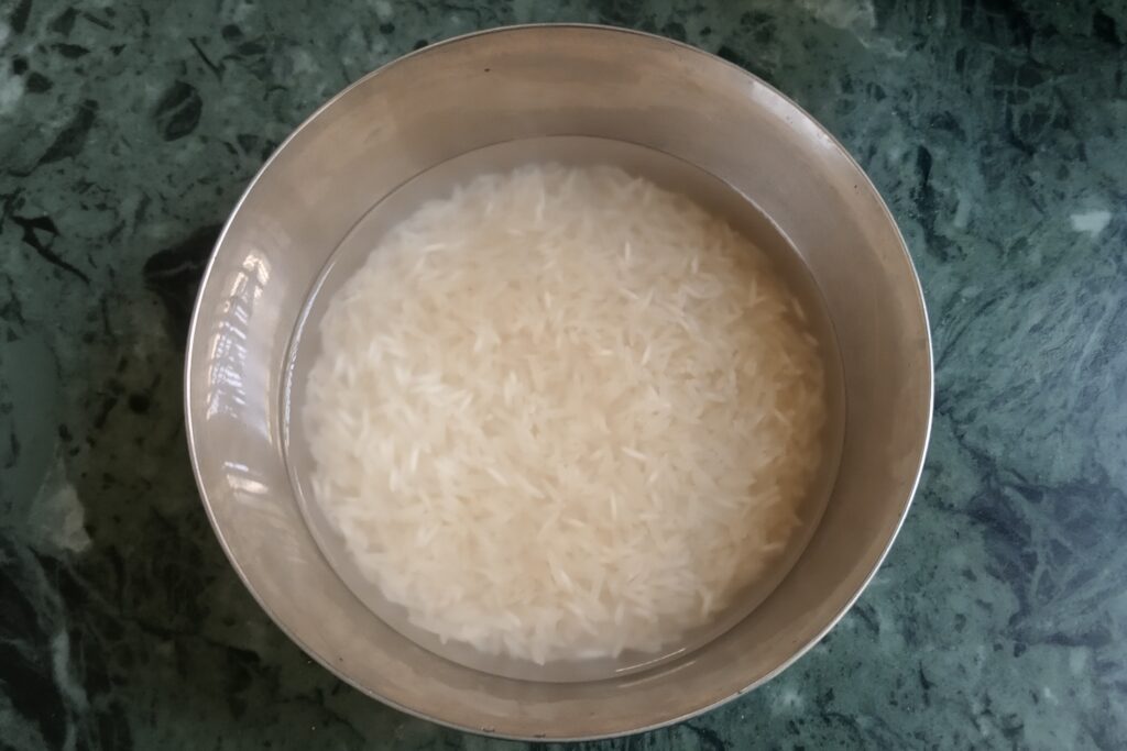 soaked rice in a bowl