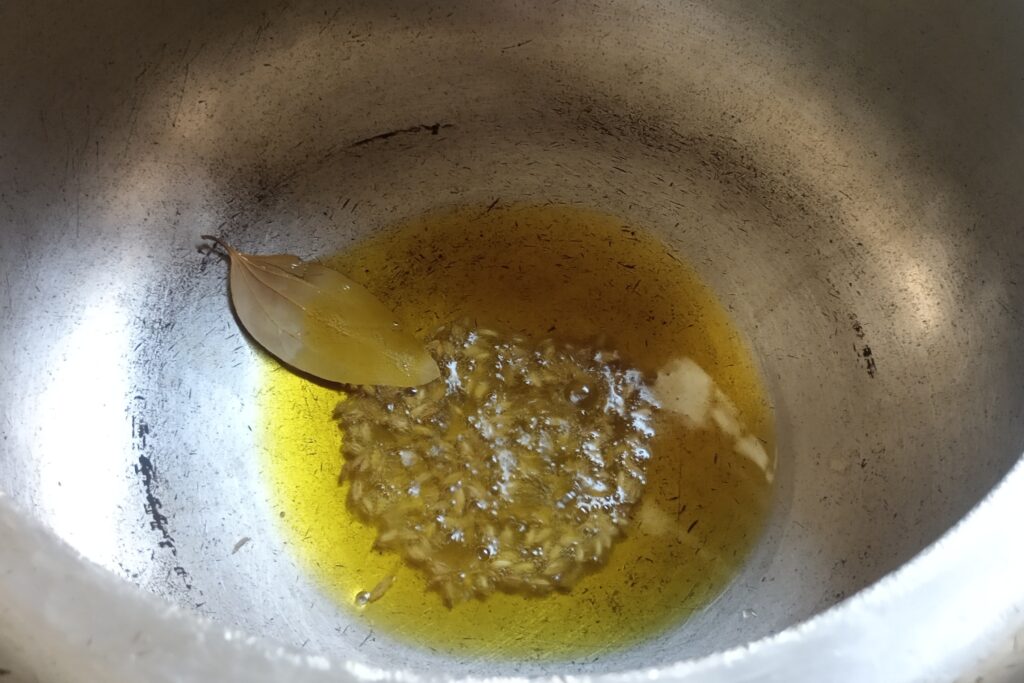 tempering bay leaf and cumin seeds
