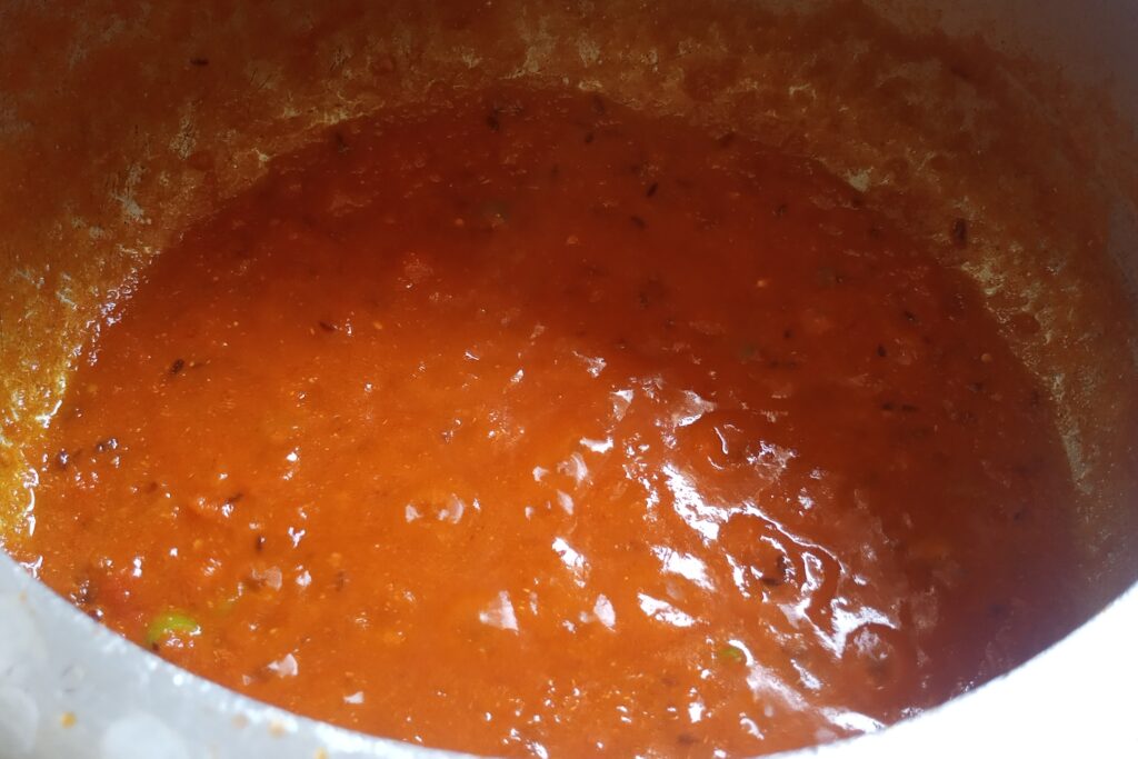 making tomato masala