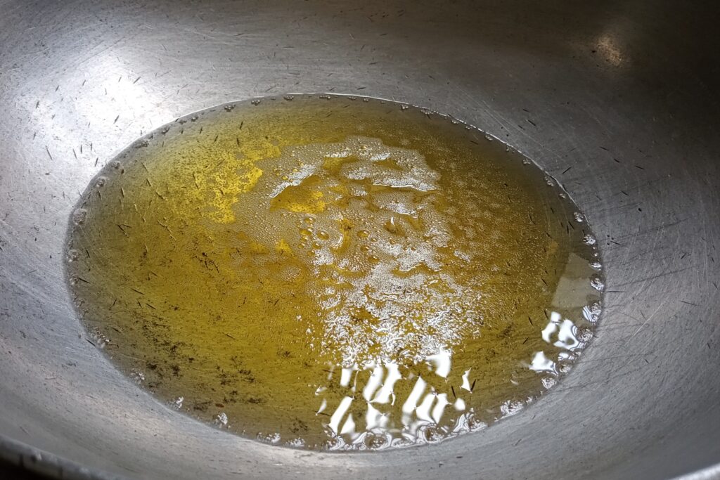 heating ghee in a kadai