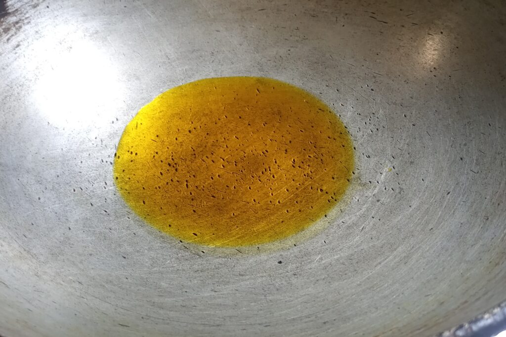 heating oil in a kadai