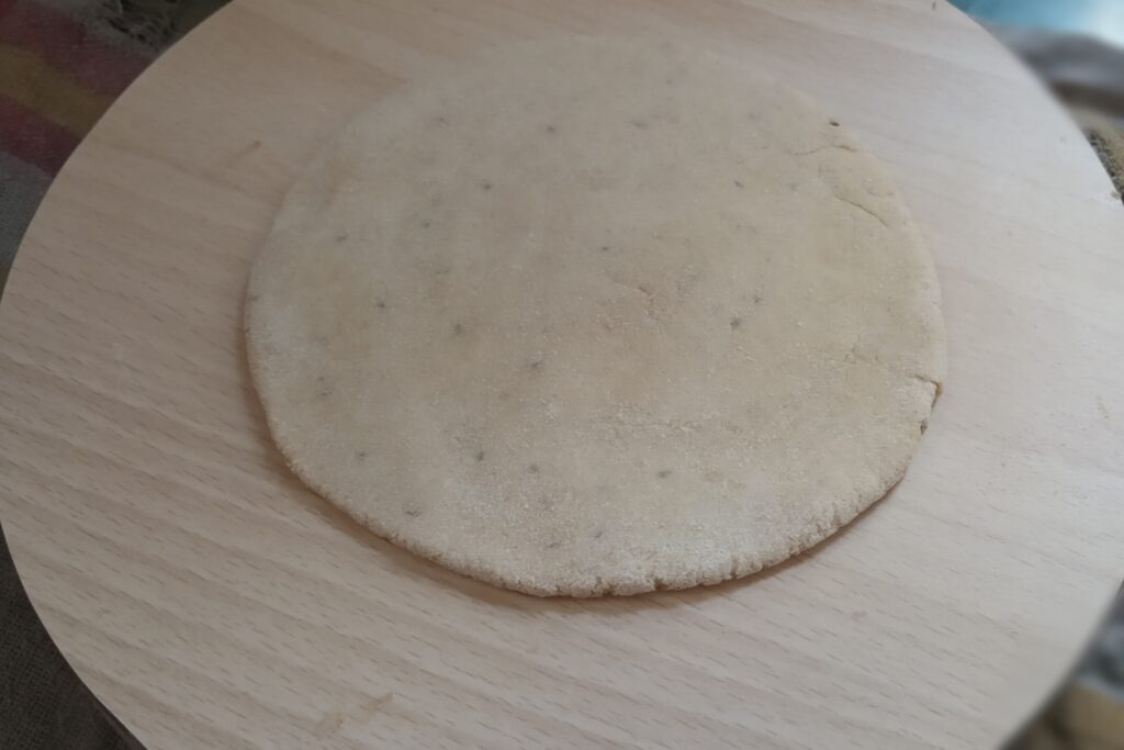 rolled dough ball in a small circle