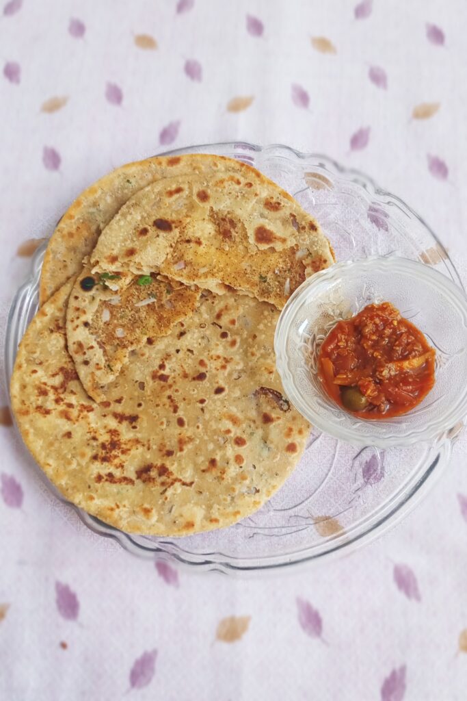 top shot of stuffed sattu paratha recipe and pickle