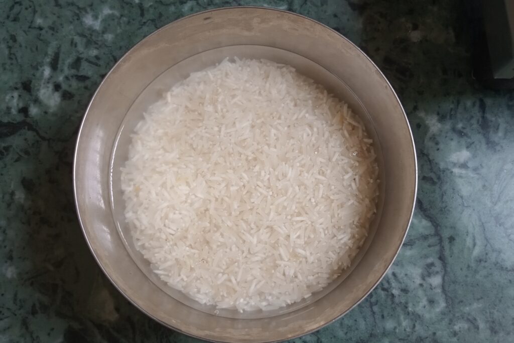 soaked rice in a bowl