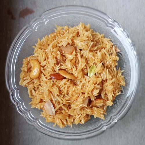 jaggery rice in a glass bowl