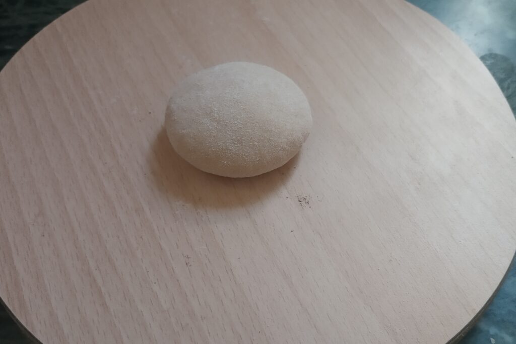 dough ball on the rolling board