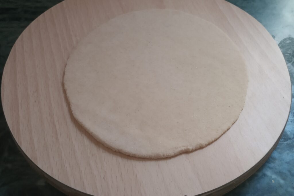 a small rolled circle on the rolling board