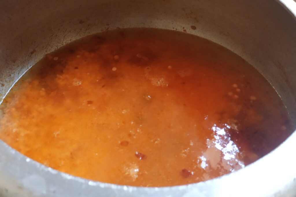 pouring water in the the dal
