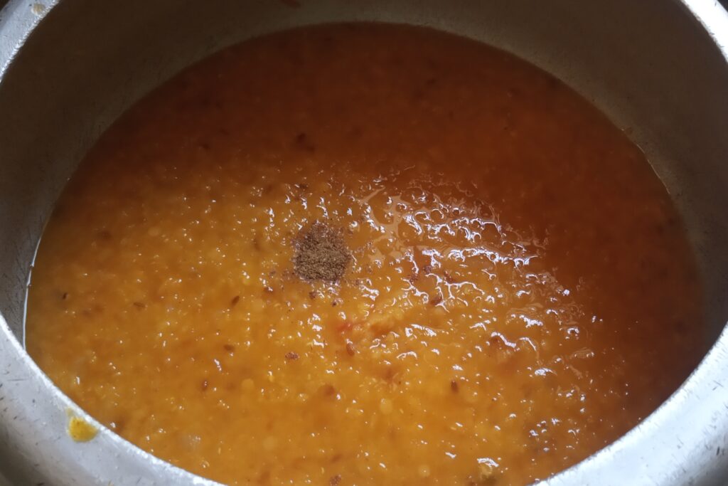 adding garam masala in the dal