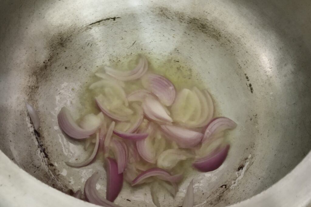 add sliced onions to saute