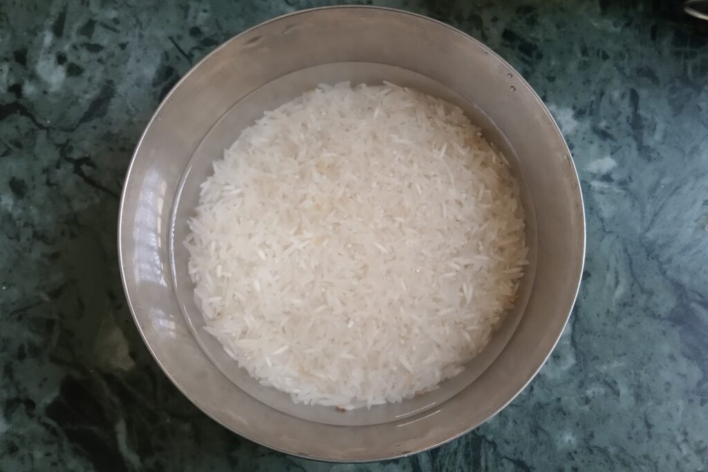 soaked rice in a bowl