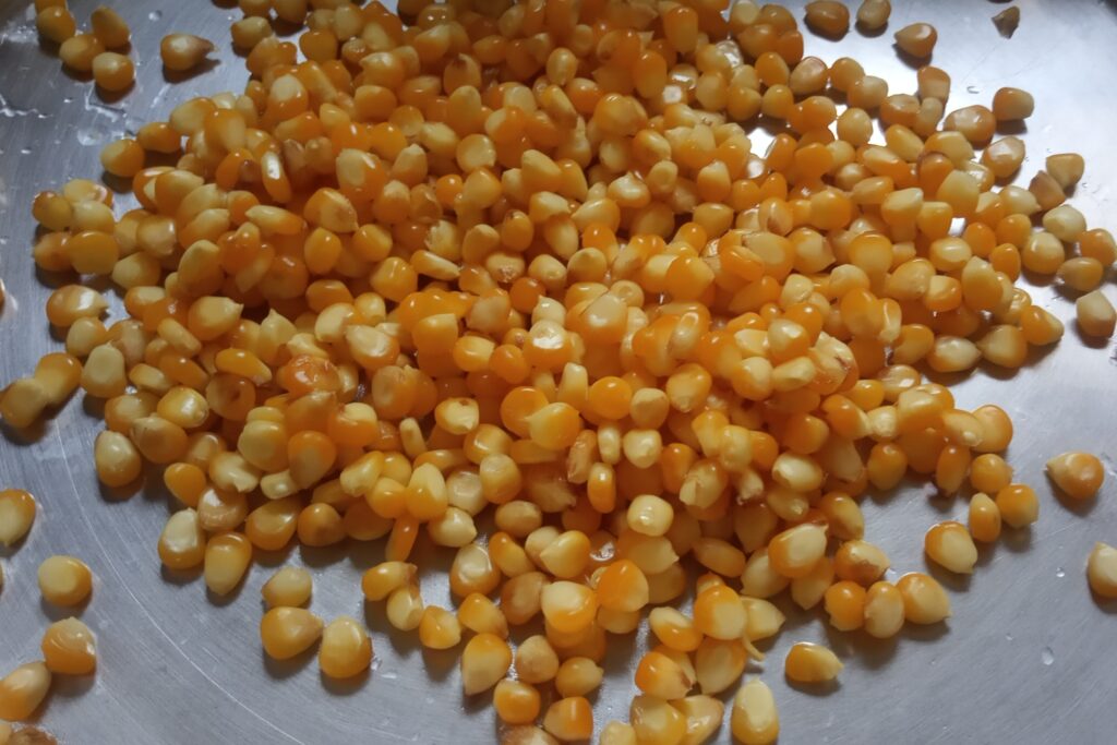 boiled sweet corn kernels in a plate