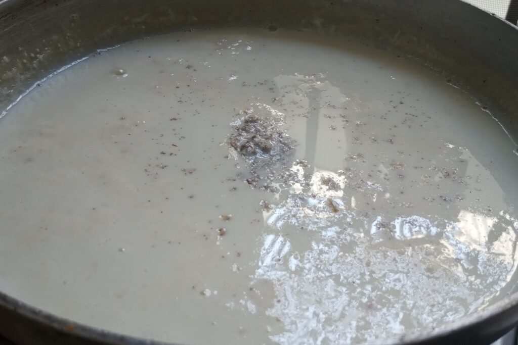 Adding cardamom powder