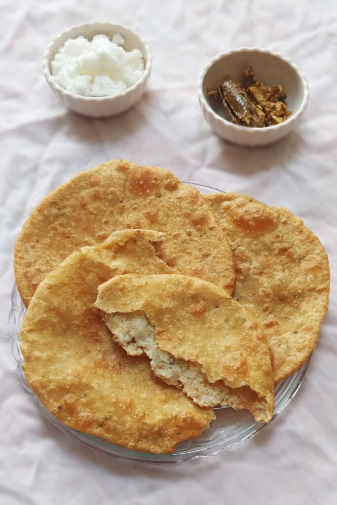 Stuffed potato poori served with pickle