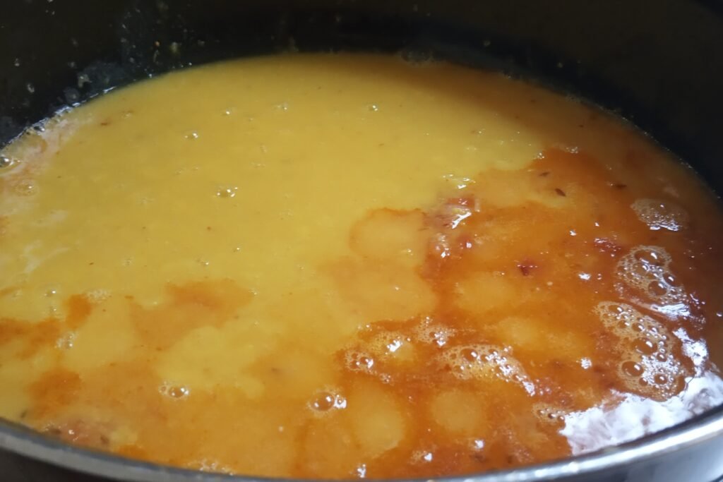 Adding cooked dal