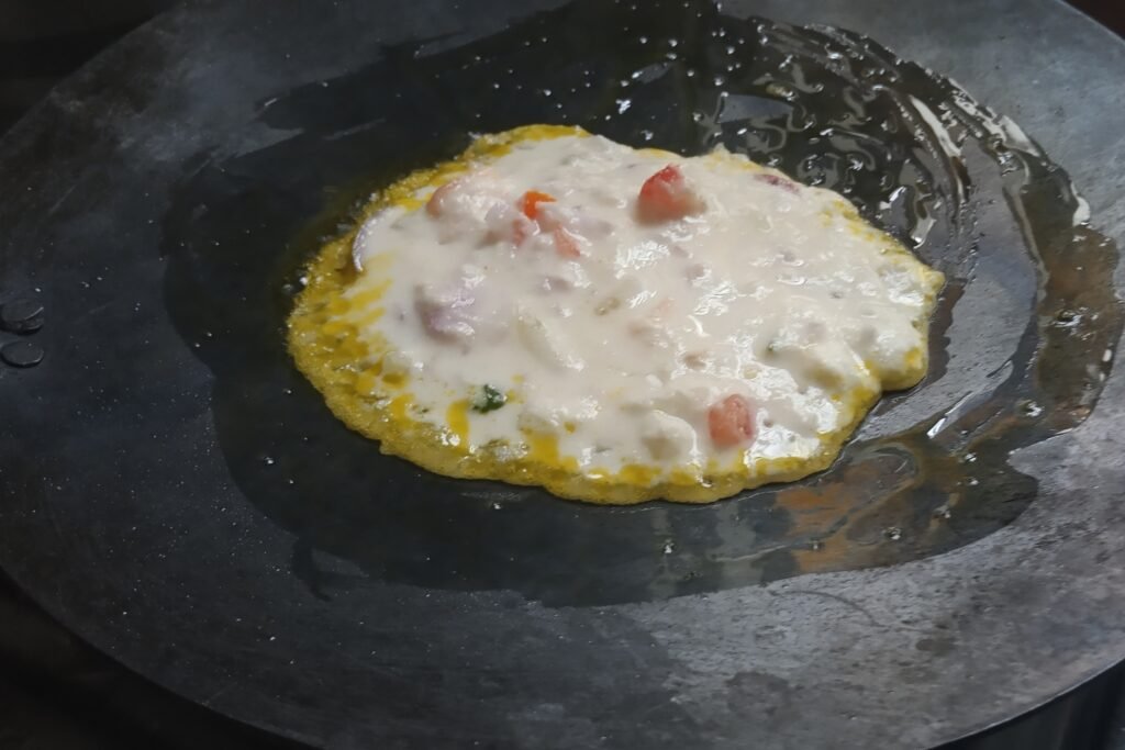 Adding spoonful batter
