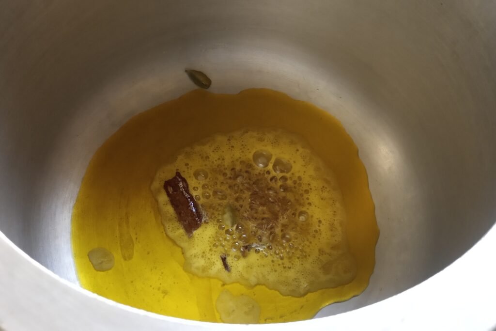 Tempering whole spices