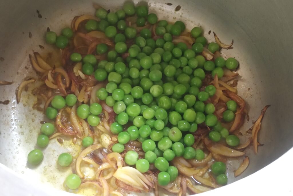 Adding green peas