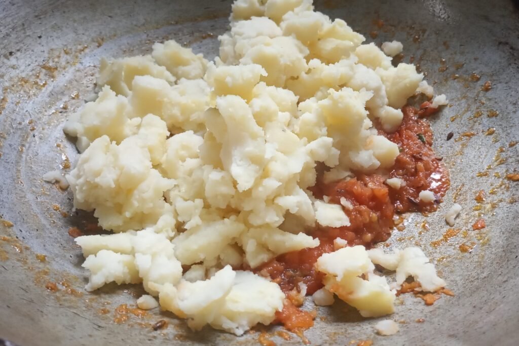 Adding mashed potatoes