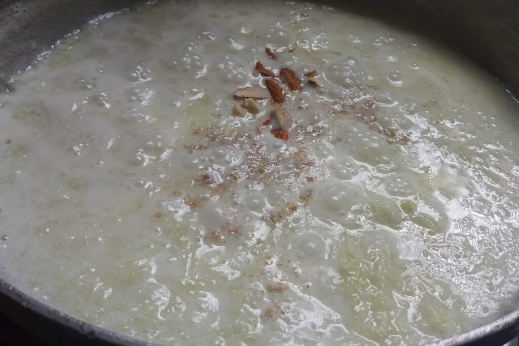 Adding almonds and cardamom