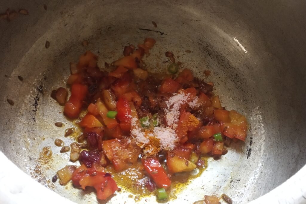Adding chili salt and turmeric