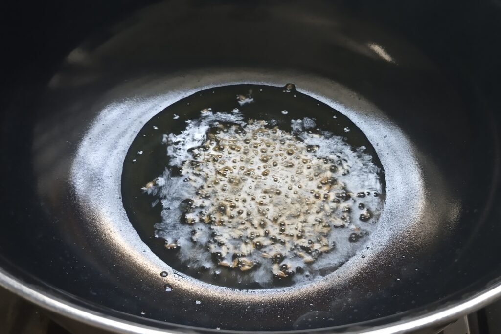 Tempering cumin seeds