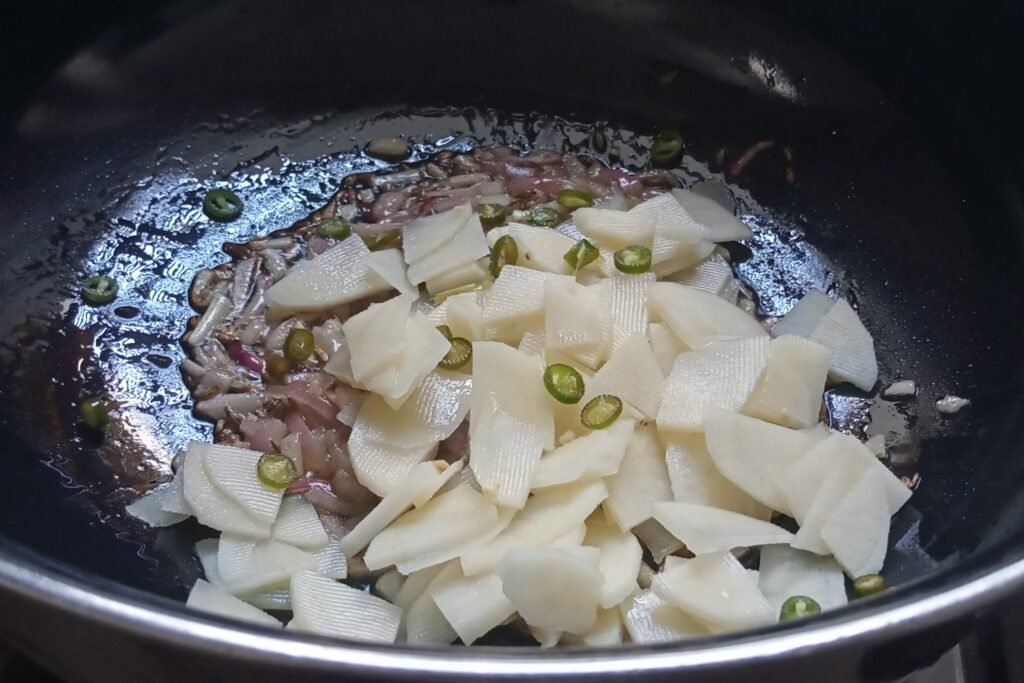 Adding potato and chili