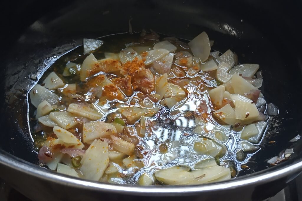 Adding water and spices