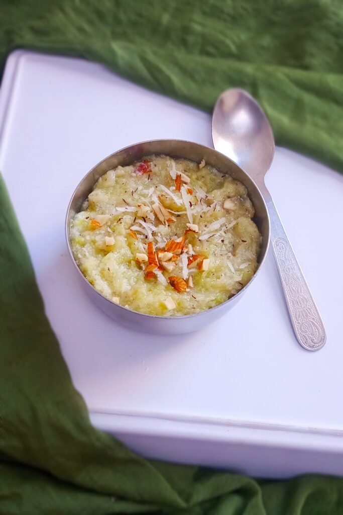 Lauki halwa garnished with nuts