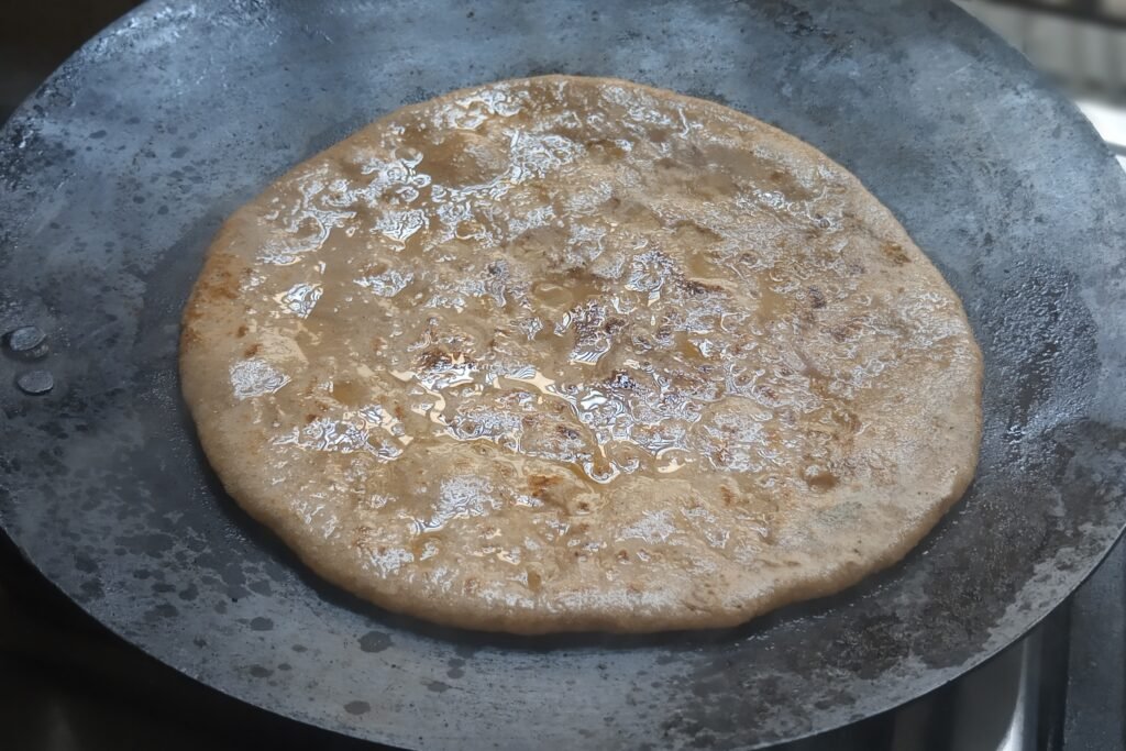 Cooking paratha