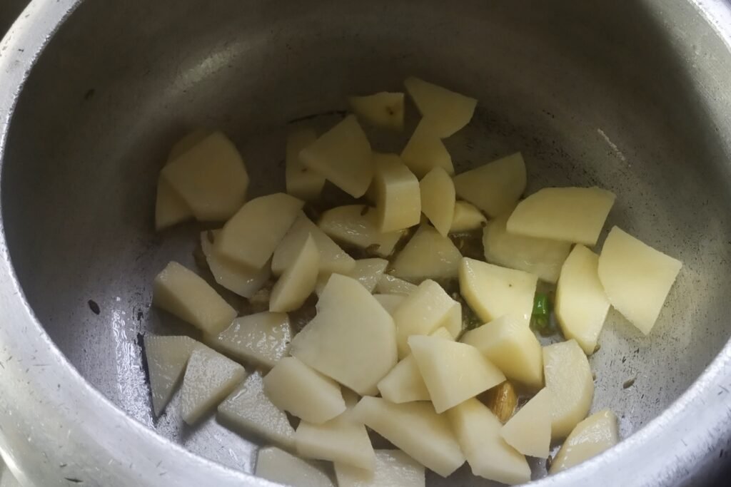Adding potatoes