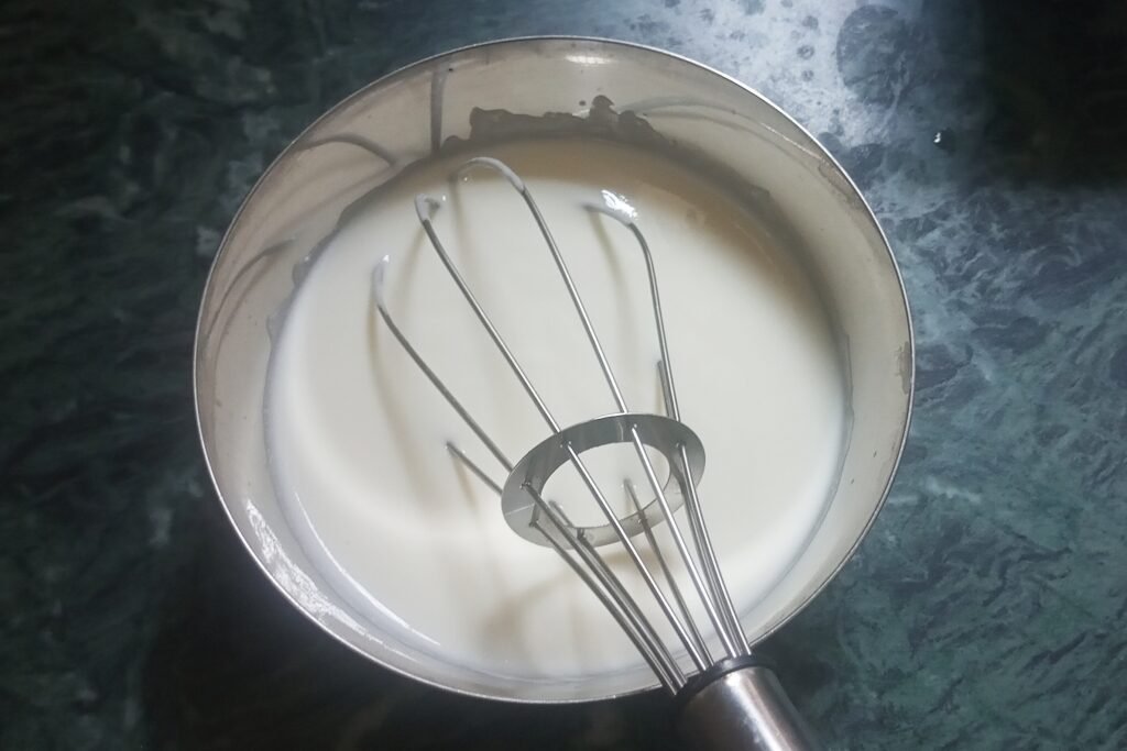 Whisking curd