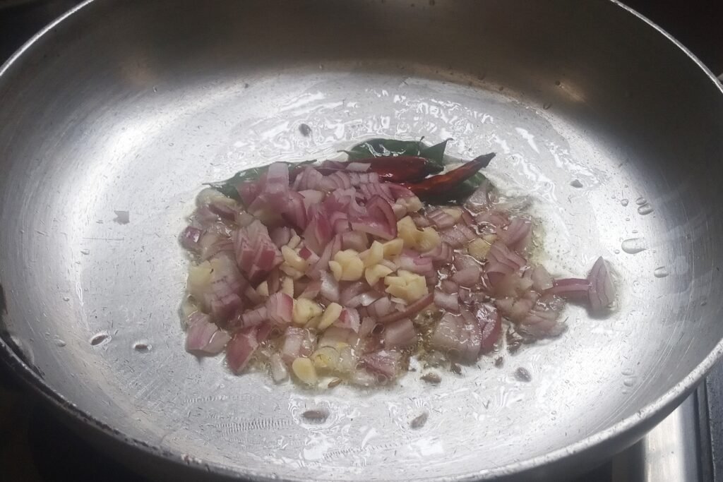 Adding chopped onion and garlic